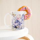 Butterfly_Fairy_15ozWhiteMugLifetsyleDonutLH_Mockup.png